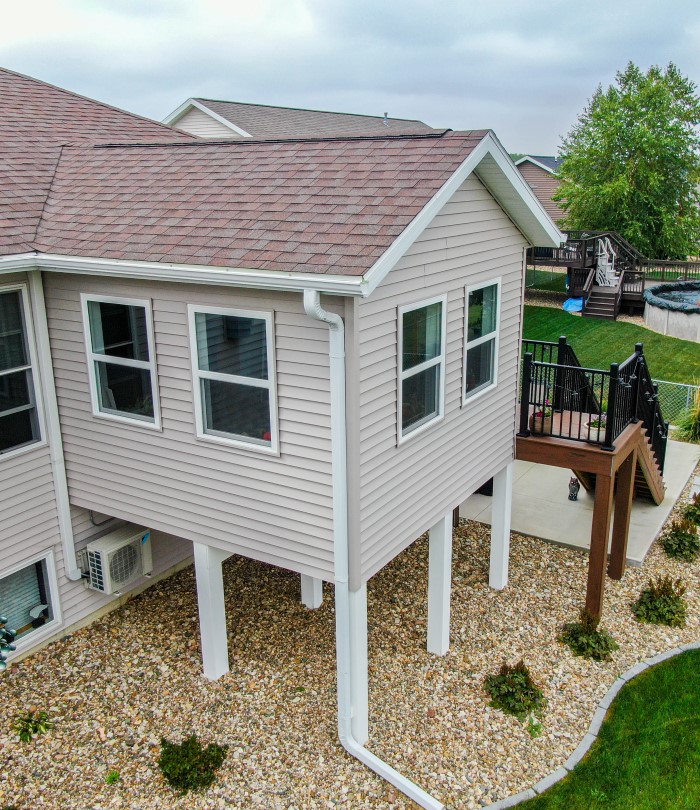 Second-Story Elevated Home Addition with Multi-Level Outdoor Features in Cedar Falls, IA